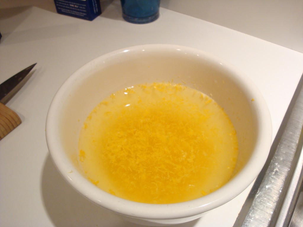 Lemon zest soaking in water