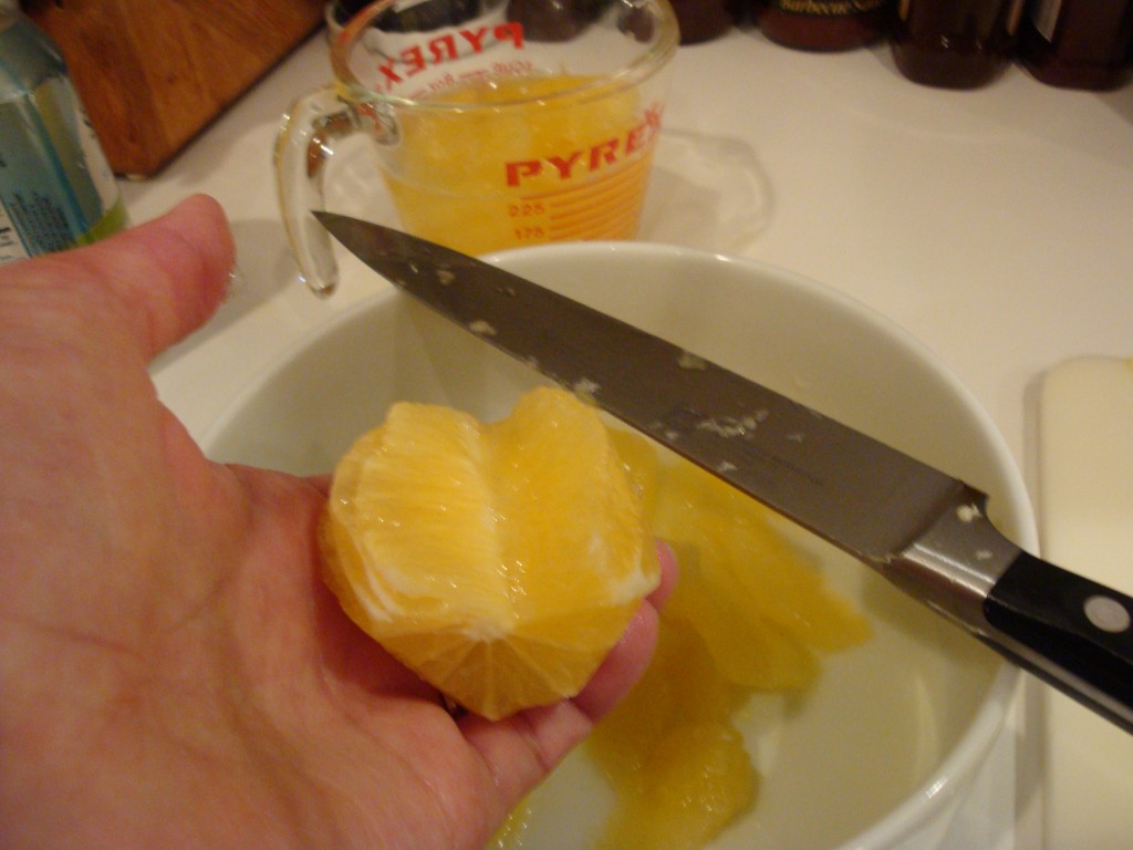 Supreming lemons, step two: cut out segments.